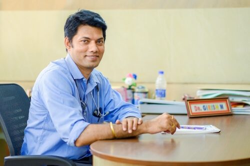 Dr. Girish M